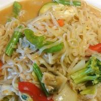 Noodle Pick King · Spicy. Pan-fried rice noodles in creamy coconut milk, with broccoli, carrots, green beans, z...
