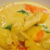 Yellow Curry · Gluten free, spicy. Yellow curry paste with coconut milk, Thai basil, potato and carrots. Se...