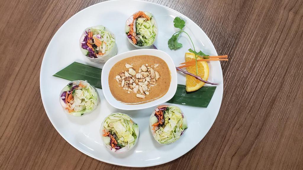Fresh Spring Roll  · Shrimp or chicken, carrot, cucumber, Thai basil, rice noodles wrapped in rice paper, served with peanut sauce.