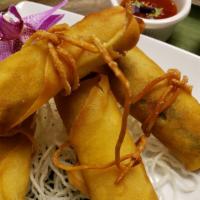 Deep Fried Spring Rolls (4) · Choice of chicken or vegetable deep-fried served with sweet chili sauce.