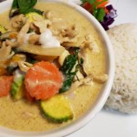 Green Curry  · Thai palm signature green curry paste, bell pepper, zucchini, bamboo shoots, carrots, and Th...