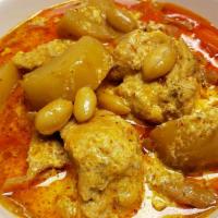 Massaman Curry · Thai palm signature massaman paste, potatoes, carrots, bell peppers, onions, and peanuts. Se...