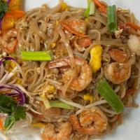 Pad Thai · Thai palm signature pad thai sauce with rice noodles, eggs, bean sprouts, carrots, and chive...