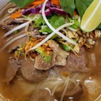 Thai Noodle Soup · Steak, beef meatball and brisk cooked in chicken broth, green onion, garlic oil, crushed pea...