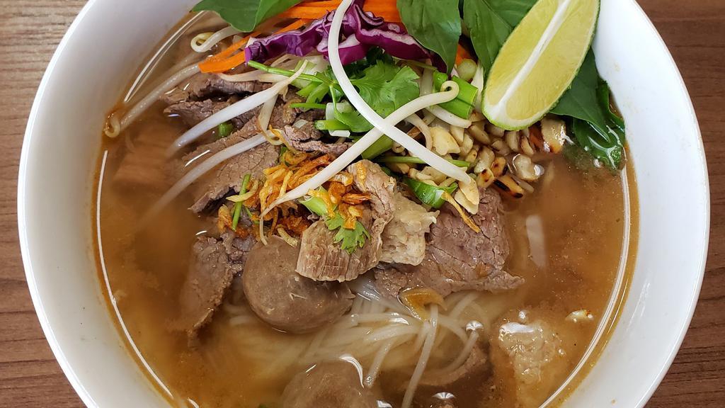 Thai Noodle Soup · Steak, beef meatball and brisk cooked in chicken broth, green onion, garlic oil, crushed peanuts.