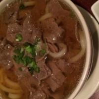 Beef Udon  · Udon noodles in a fish broth with beef.