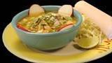 Pozole · Fiery. A flavorful blend of spicy pork and hominy. Served with red onion, cabbage, cilantro ...