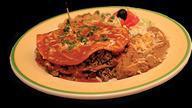 New Mexico Enchiladas · Fiery. Triple layer enchiladas with your choice of machaca beef, ground beef or chicken guis...