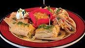 Arriba® Sampler Plate · One green corn tamale, two mini tacos, two mini chimis, two flautas and refried beans.