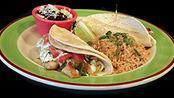 Fish Taco Plate · Grilled or fried white fish nestled in two corn tortillas with our creamy hatch chile sauce, pico de gallo and topped with shredded cheese. Served with rice and your choice of beans.