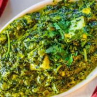 Saag Paneer · Homemade cubed farmers cheese cooked in a delightful creamy spinach sauce. An Indian special...