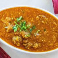 Rogan Josh · A classic lamb curry with fragrant spices and yogurt.