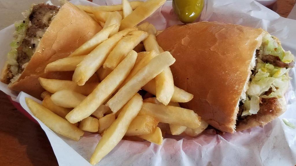 1/2 Super · Our famous Italian Sausage sandwich with american, swiss and pro cheeses for the cheese lover. Served on a mini-loaf with mustard, lettuce, french fries and a side of cherry peppers.
