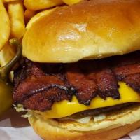Bacon Cheese Burger · 1/4 pound burger served with our custom weave of bacon slices and American cheese. Garnished...