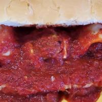 Meatball Sub · Our handmade meatballs tucked between a locally baked bun, provolone cheese, and our famous ...