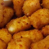 Cheese Curds · Wisconsin battered for the perfect crunch.