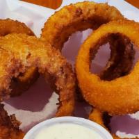 Onion Rings - Half · Gourmet breaded 3/4 inch thick cut onion rings with a perfect crunchy texture.