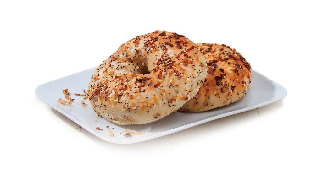 Bagels & Spreads|Everything Bagel · A soft bagel with a golden crust, topped with poppy seeds, sesame seeds, and onions. 270 Calories