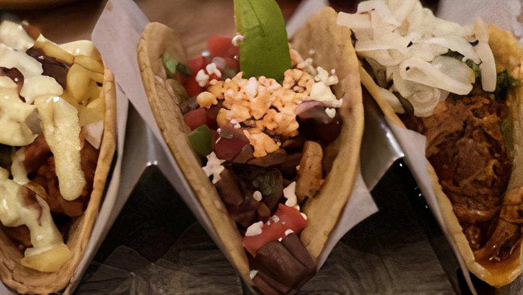 Choose 3 Taco Platter · Choice of 3 tacos and 2 sides