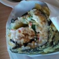 California · Deep fried roll with crab salad, spinach, cream cheese, avocado, cucumber, red tobiko, spicy...