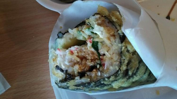 California · Deep fried roll with crab salad, spinach, cream cheese, avocado, cucumber, red tobiko, spicy mayo & eel sauce.