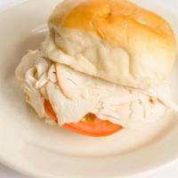 Turkey Sandwich · House Oven Roasted Turkey Breast. Servied on a Toasted Bun, with Lettuce, Tomatoes & Mayo.