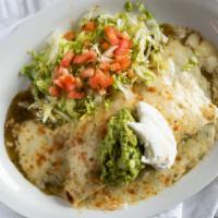 Pueblito Burrito · Soft giant flour tortilla stuffed with carne asada (char-broiled top sirloin steak), rice, b...