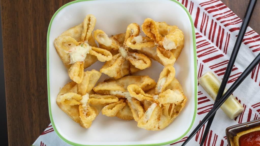 Crab Cheese Wontons (6 Pieces) · Cream cheese blended with imitation crab and green onion.