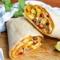 Tacoma Burrito · Scrambled eggs,  ham, seasoned potatoes, sautéed onions and peppers,  cheese