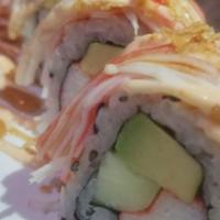 Crab Lover Roll · California roll, topped with shredded Crab stick spicy mayo, eel sauce, and crispy garlic.