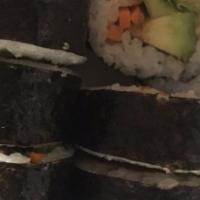 Vegan Roll · Vegan, spicy. Carrot, inari, daikon, shaved cabbage, cucumber, avocado, green leaf lettuce w...