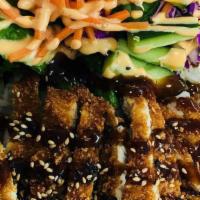 Chicken Katsu · Breaded and fried chicken served with steamed rice and salads.