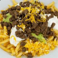 Carne Asada Fries · french fries   with carne asada,cheese sour cream and guacamole.