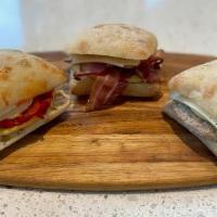 Bacon Breakfast Sandwich · Bacon, cage free eggs, garlic aioli on a Ciabatta bun