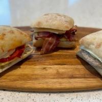 Sausage Breakfast Sandwich · Sausage, cage free eggs, garlic aioli on a Ciabatta bun