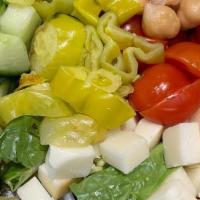 Chop Salad · Romaine, Salami, Smoked Mozzarella, Taggiasca Olives, Cucumbers, Tomatoes, Chickpeas, Pepper...