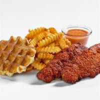 Tenders And Waffles · Served with a Belgian Waffle, Pickles and House Sauce