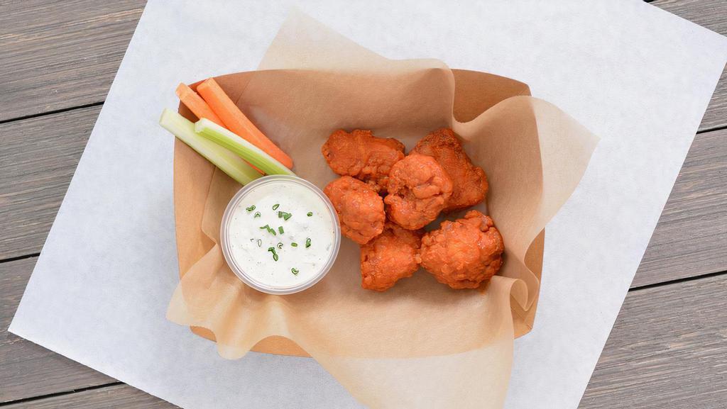 6 Crispy Boneless Wings · 6 Crispy boneless chicken wings tossed in 1 wing flavor and served with fresh carrot & celery sticks and homemade buttermilk ranch or blue cheese dressing.