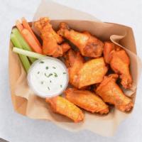 8 Classic Bone-In Wings · 8 Classic bone-in chicken wings tossed in 1 wing flavor and served with fresh carrot & celer...