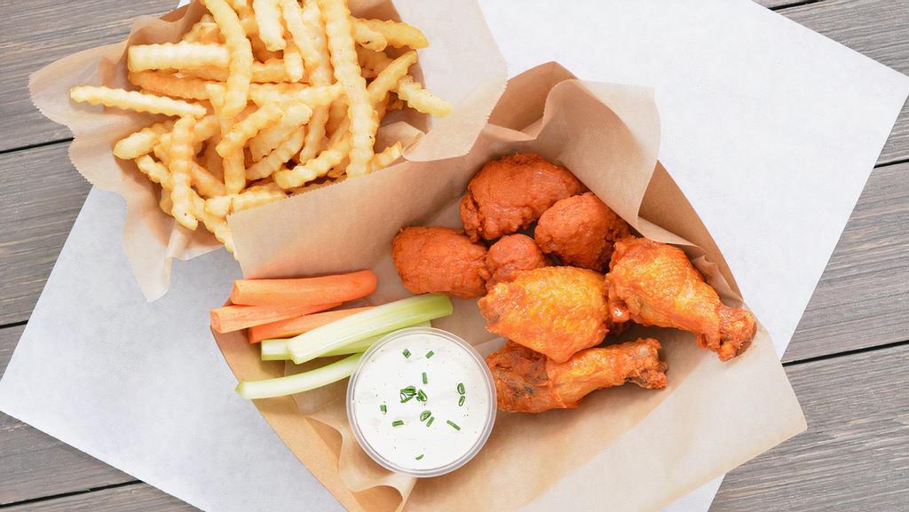3 Classic Bone-In Wings + 4 Crispy Boneless Wings Combo · 3 Classic bone-in chicken wings and 4 crispy boneless wings tossed with up to 2 wing flavors and served with fresh carrot & celery sticks and homemade buttermilk ranch or blue cheese dressing + Fries.