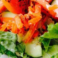 Dinner Salad · Lettuce, tomato, carrots, cucumber and your choice of dressing.