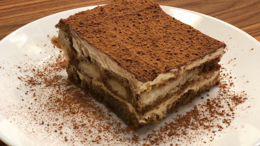 Tiramisu · Tiramisu is a coffee-flavored Italian dessert. It is made of ladyfingers dipped in coffee, layered with a whipped mixture of eggs, sugar, and mascarpone cheese, flavored with cocoa.