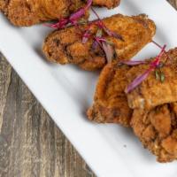 The Dry Jerk Chicken Wings · Classic Jamaican spice blend of earthy and sweet