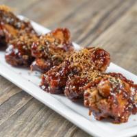 Korean Bbq Chicken Wings · Gochujang Glaze, Crispy Ginger
Cilantro, Toasted Sesame