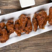 Fire Sauce Chicken Wings · 5 peppers, one is a ghost (not deadly but scares ya a bit)