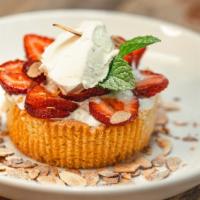 Brown Butter Cake · Roasted Strawberries, Whipped Mascarpone, Toasted Almonds.