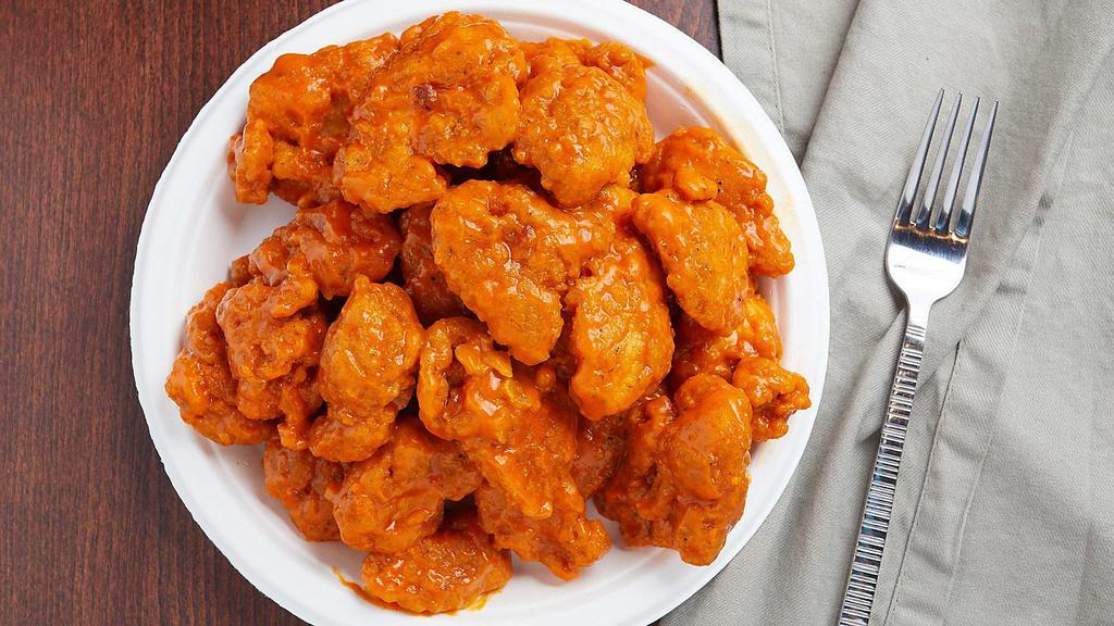 Buffalo Boneless Chicken Wings · Boneless, chicken breast, tossed with hot sauce for a spicy chicken wing.