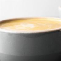Flat White (6Oz) · Double shot with four ounces of milk, light foam and a coffee forward pour.