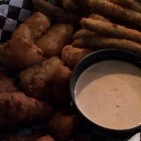 Fried Steak Basket · Battered steak bites, green bean fries and a side of gouda bites, served with chipotle ranch...