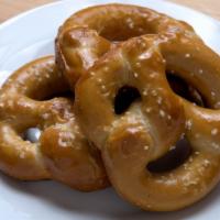 Pub Pretzels & Beer Cheese · Three soft baked pretzels served with beer cheese sauce.
